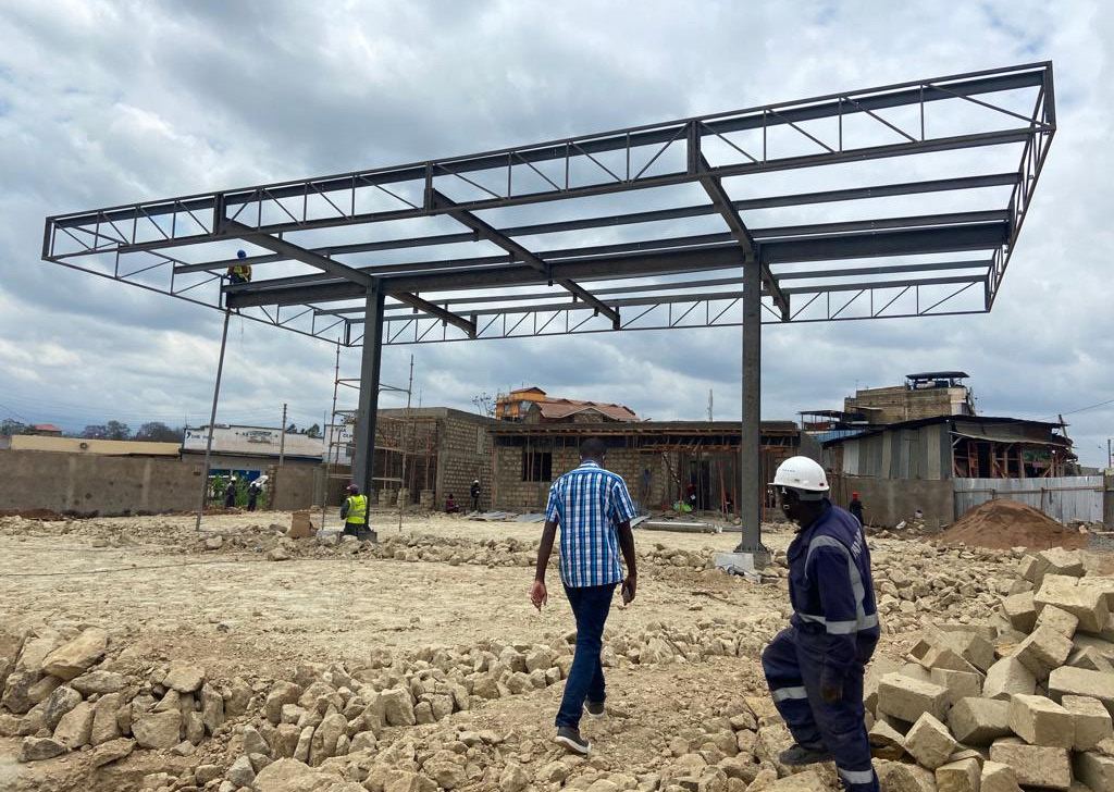 Canopy steel structure under construction at a Mansa Consultants fuel station engineering project